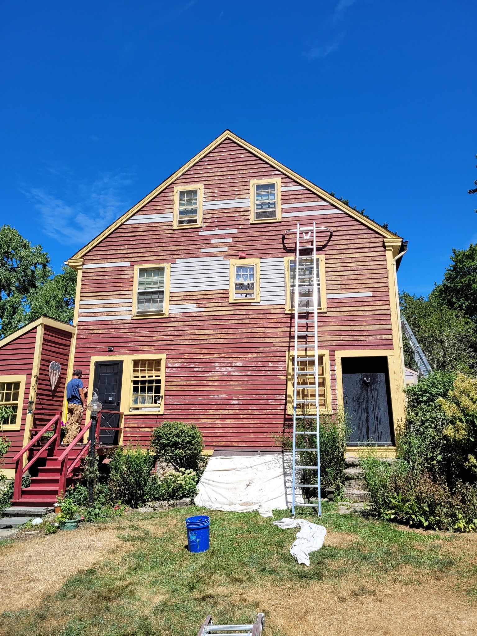 Home's exterior before paint restoration