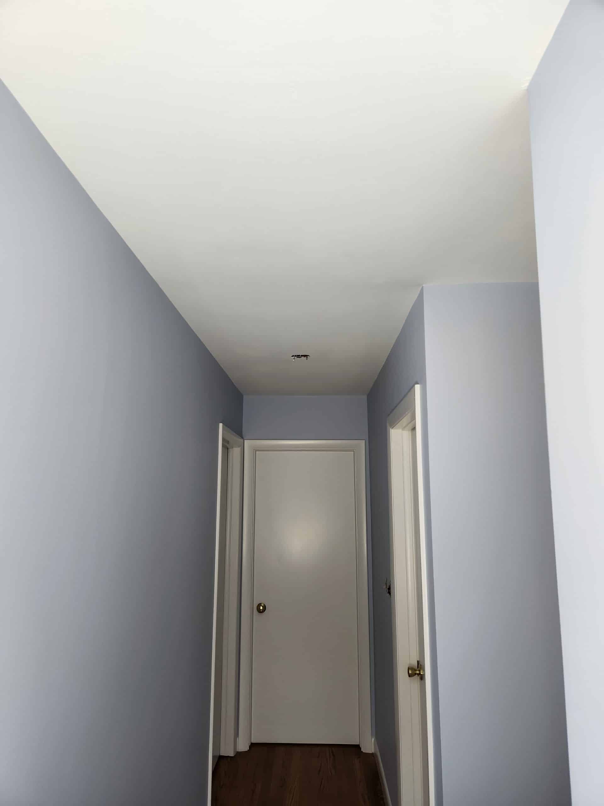 Home's hallway interior painted white