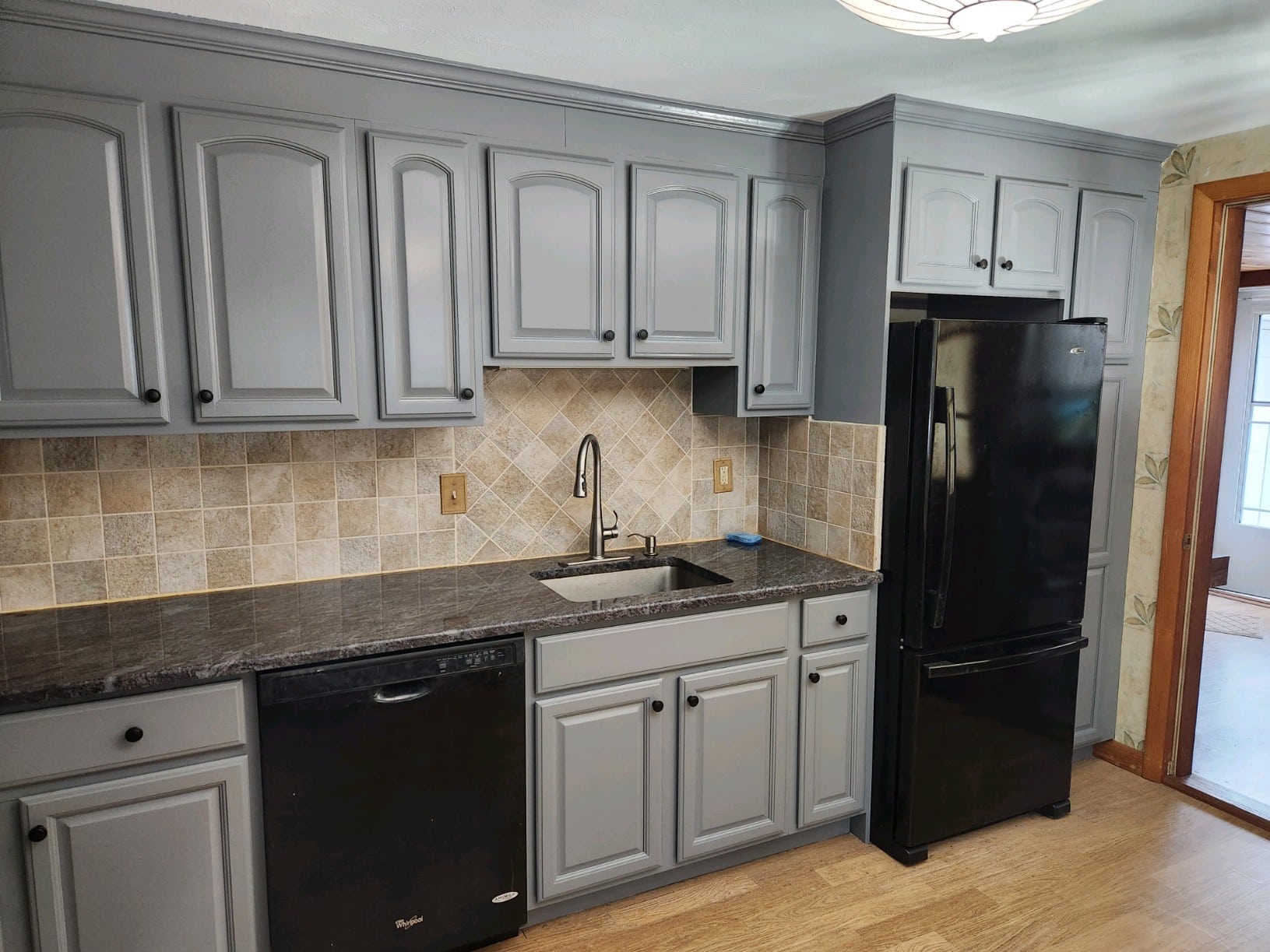 Home's kitchen painted dark grey